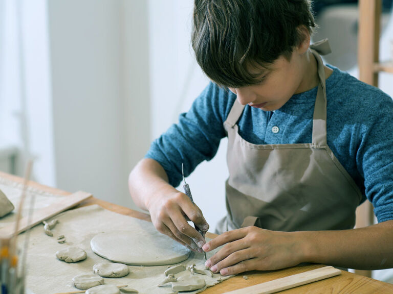 boy modelling clay