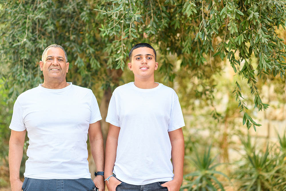 parent supporting teen outside