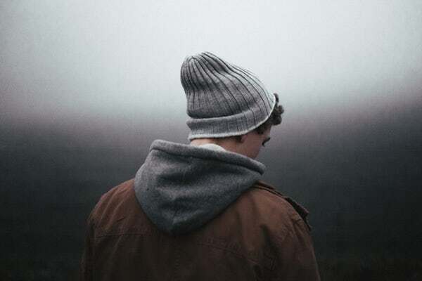 boy in hat and hoodie
